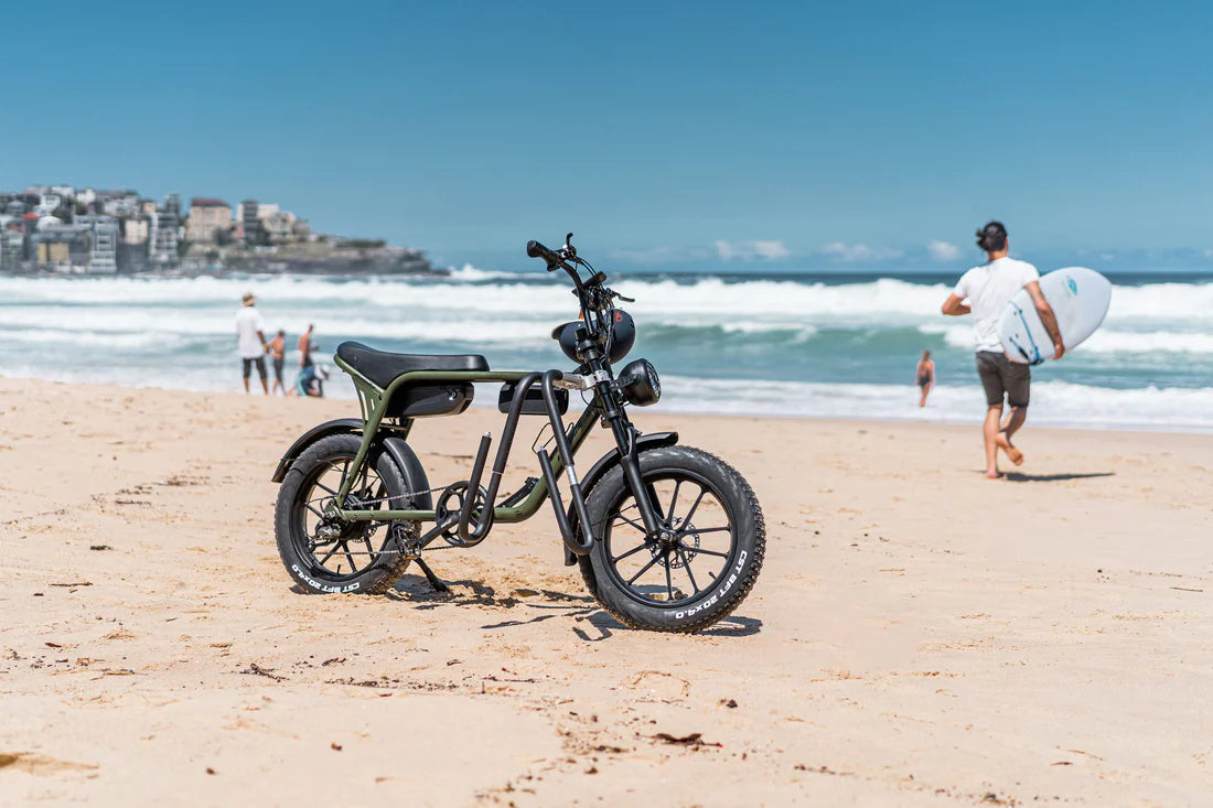 SalteBikes Fat Tire All-Terrain Cruiser Bike on a Beach – Stylish electric bike with fat tires, perfect for sand, trails, and city rides. Explore the best price at SalteBikes.