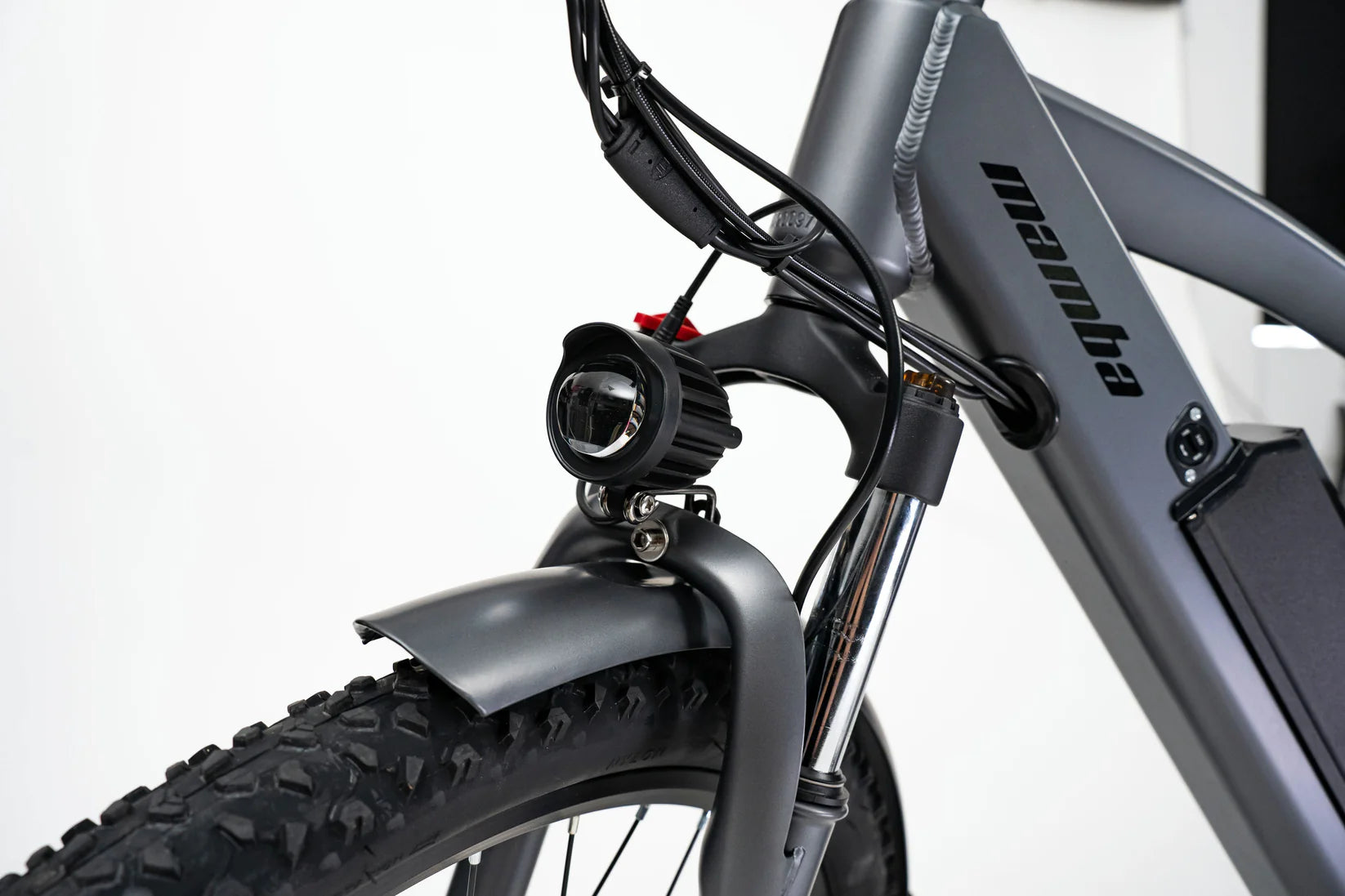 Close-up of the bright LED headlight on the Mamba Venom 2024 e-bike, perfect for safe night riding, available at SalteBikes