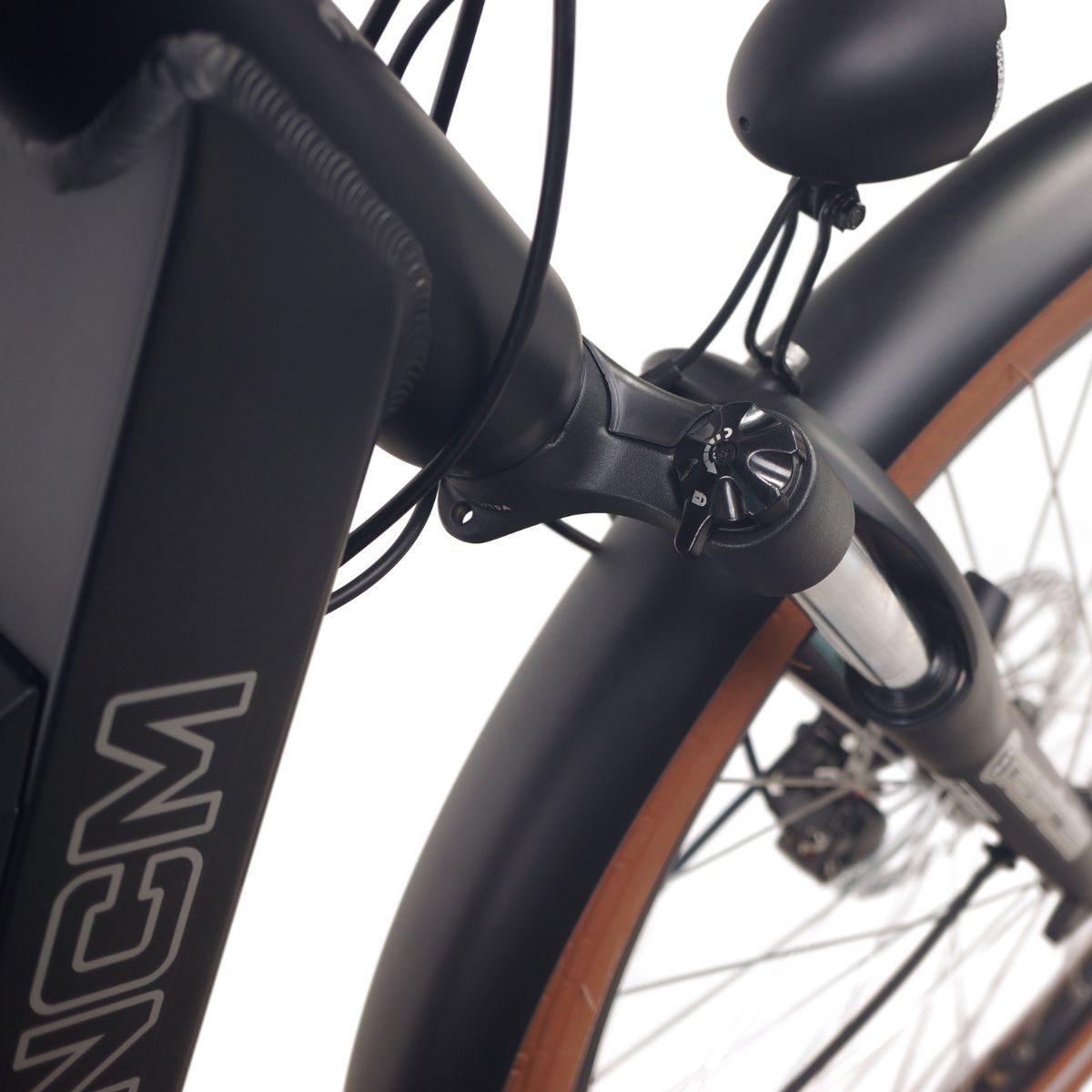 Close-up of NCM Cru7s Step-Through Cruiser E-Bike front wheel and lock function by SalteBikes, featuring sturdy wheel design and secure anti-theft lock feature.