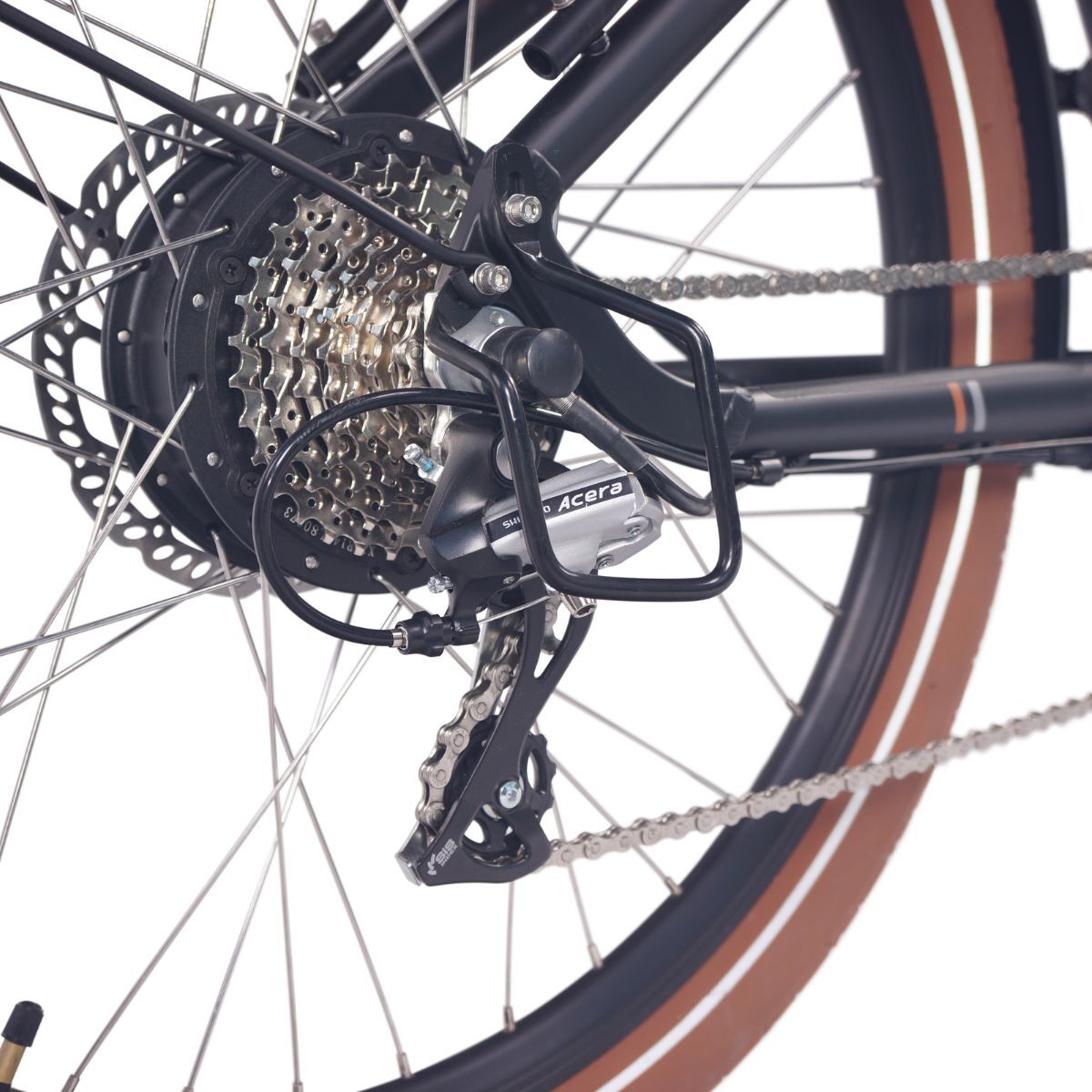 Close-up of Shimano 8-speed gears and drivetrain on NCM Cru7s Step-Through Cruiser E-Bike by SalteBikes, offering smooth shifting and reliable performance.