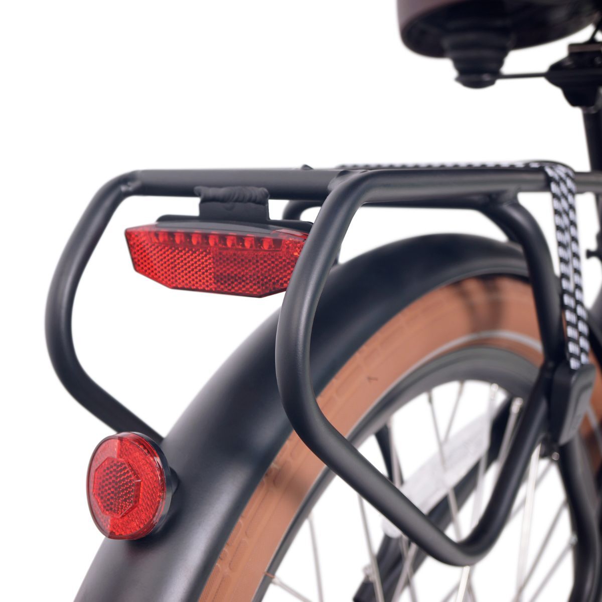 Close-up of bag rack on NCM Cru7s Step-Through Cruiser E-Bike by SalteBikes, designed for carrying cargo with ease and stability.