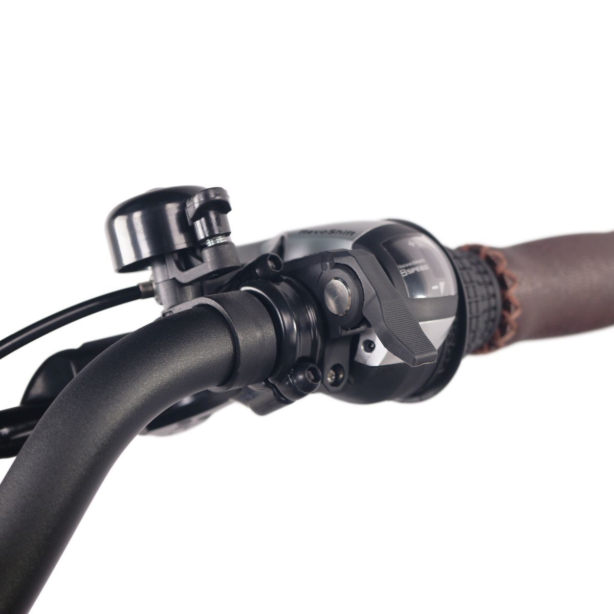 Close-up of right handlebar on NCM Cru7s Step-Through Cruiser E-Bike by SalteBikes, featuring a Shimano 8-speed gear shifter, bell, and ergonomic grips for easy control.